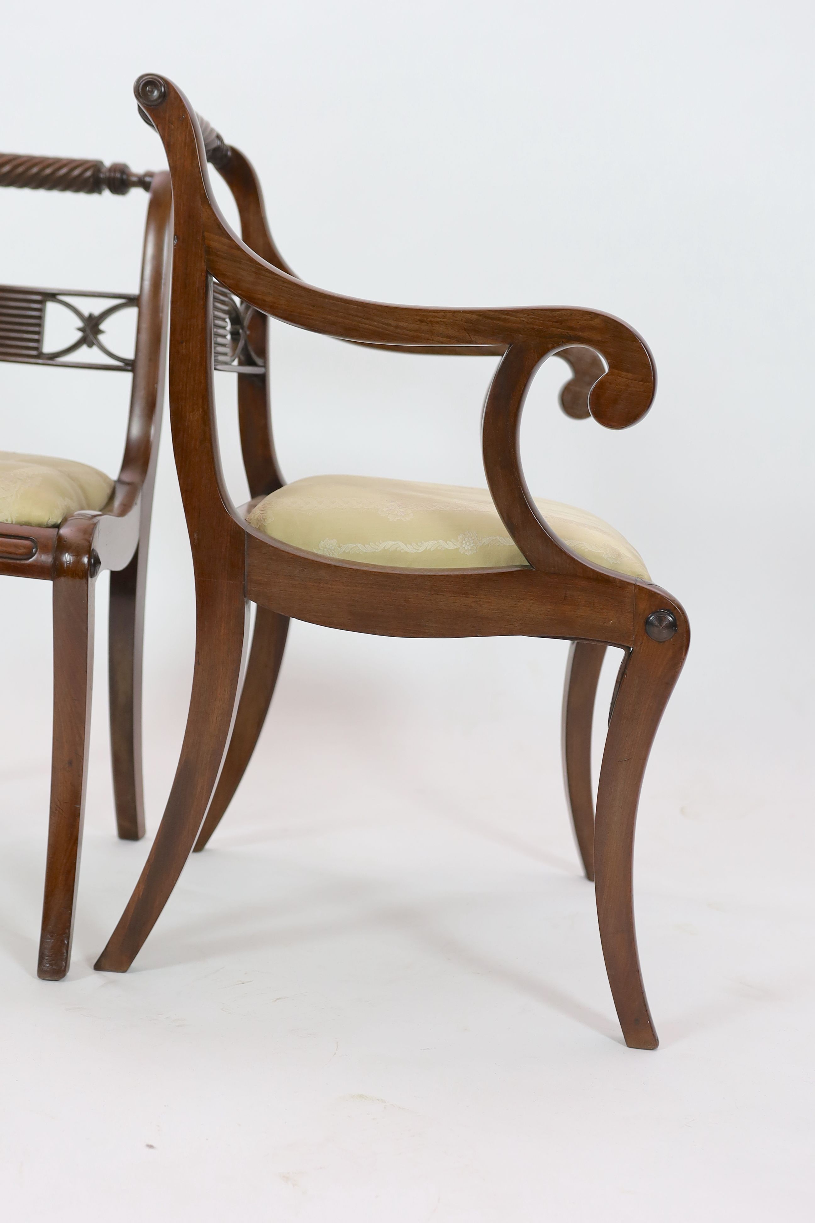A set of eight Regency mahogany dining chairs, including two carvers, carvers W.54cm D.56cm H.84cm